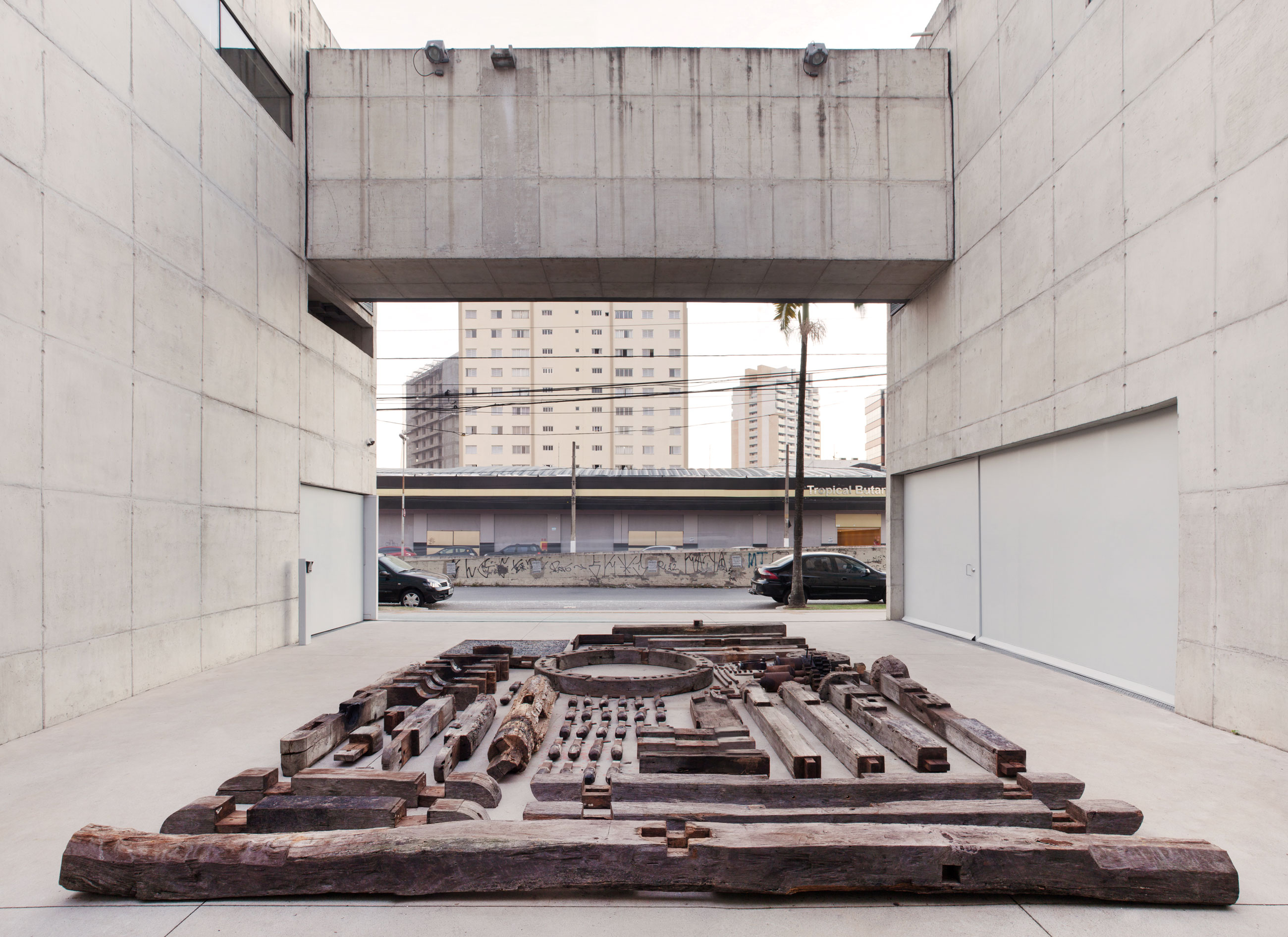 Site-specific Installation titled Phantom Matrix by artist Beto Shwafaty consisting of Sugarcane mill, electric motor, loudspeaker and audio, curated by Bruno Alves de Almeida for the project SITU at Galeria Leme, São Paulo, Brazil.